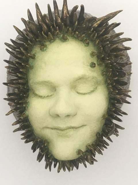Sculpture art by Julie Fiedler of a human face